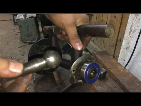 Видео: Замена подшипников в катках на снегоходе буран