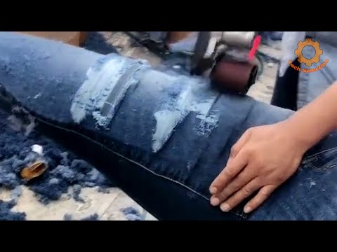 Видео: Как делают рваные джинсы в Китае