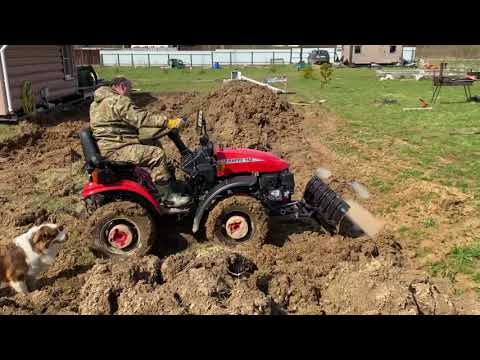 Видео: Беларус МТЗ 152Н. Отвалом роем землю