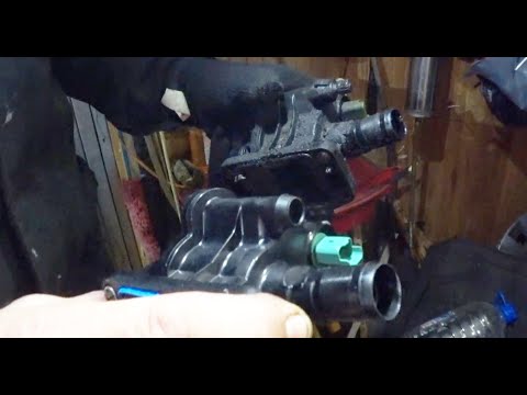 Видео: Замена термостата на Peugeot 407