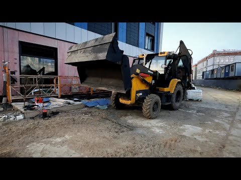 Видео: Установили челюстной ковш на экскаватор погрузчик Mecalac TLB870 в город Санкт-Петербург