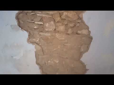 Видео: Укрепление стен из Самана (глина, солома, камни)