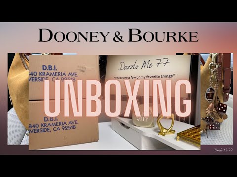 Видео: Распаковка: Dooney & Bourke Suede Hobo