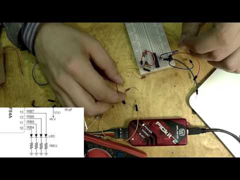 Видео: 11. Прошиваем PIC16F84A с помощью PICkit 2 и собираем схему (Урок 2. Практика)