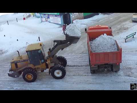 Видео: Фронтальный погрузчик Mitsuber, погрузка Камаза