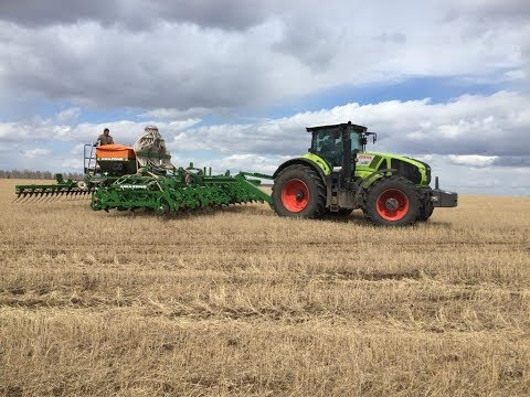 Видео: CLAAS AXION 940 & AMAZONE DMC 9000-2. Иркутская область. Посев зерновых и рапса.