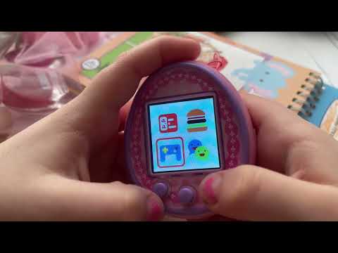 Видео: Обзор на цветной тамагочи
