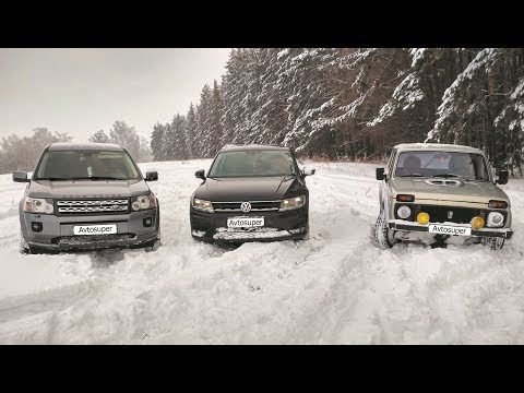 Видео: Против бездонного снега ВАЗ 2131, Land Rover, Volkswagen Tiguan Кто кого уделал? On snow offroad #42