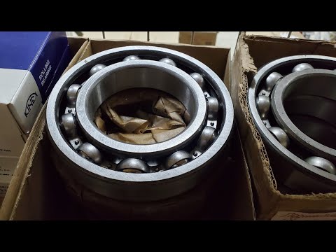 Видео: Підшипники на задню ось МТЗ.