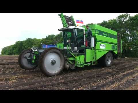 Видео: Новейший картофелеуборочный комбайн Колнаг 6200 и Пума, бункер 6 и 8 тонн, 2 и 4 ряда, самоходный и