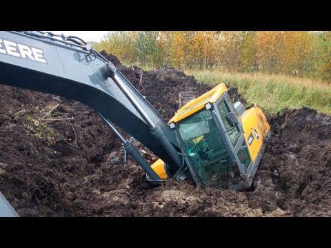 Видео: Эвакуация утонувшего Экскаватора  в торфяниках.
