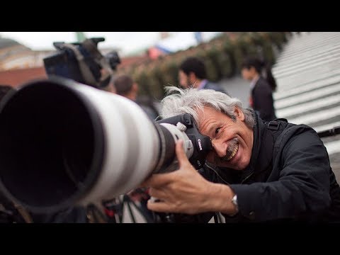 Видео: Александр Земляниченко: «Фотожурналист понимает, зачем он в данной точке в данное время»