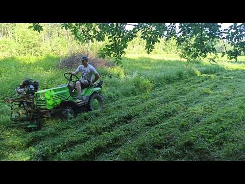 Видео: Начинаем покосы по кочкам и неровностям - Роторная косил на КМЗ =) Можно начат покосы Часть 9.