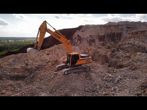 Видео: Работа на экскаваторе,погрузка, добыча.