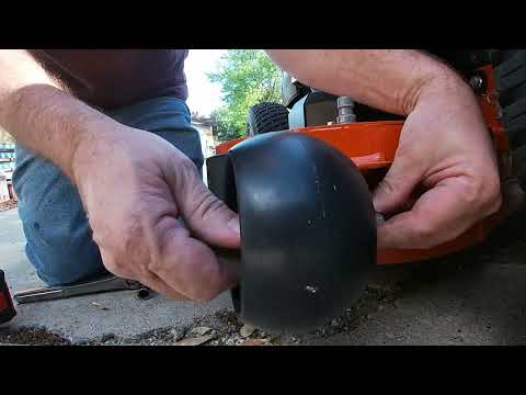 Видео: Обновление информации о садовом тракторе Husqvarna TS 248XD. Регулировка колёс Anti-Scalp.