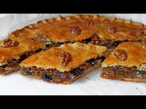Видео: Домашний пирог с грецкими орехами и изюмом очень вкусный и простой рецепт! Дамский каприз