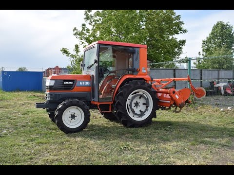 Видео: Мини трактор Kubota GT 30 с Кабиной