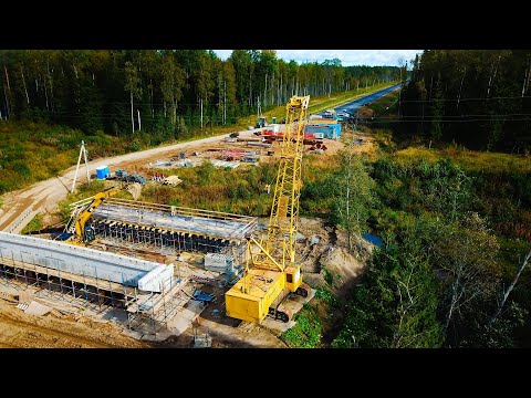 Видео: ДЭК-631А строительство моста