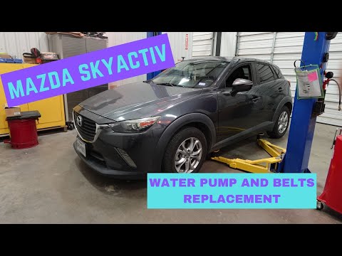 Видео: Замена водяного насоса и ремней MAZDA SKYACTIV