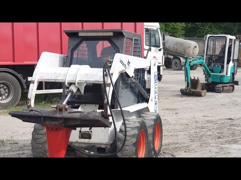 Видео: Замена колёсного подшипника BOBCAT 753