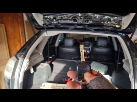 Видео: Ремонт привода багажника Lexus RX330