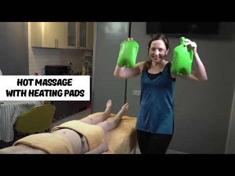 Видео: Горячий массаж с грелками