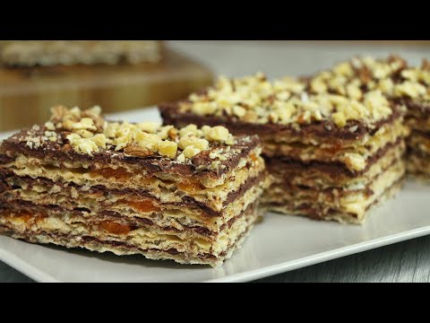 Видео: Торт без выпечки с вафельными коржами, шоколадным кремом и абрикосовым вареньем
