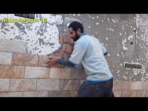 Видео: Инновационный, но несколько сложный способ укладки настенной плитки