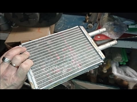 Видео: Мазда трибьют радиатор отопителя замена