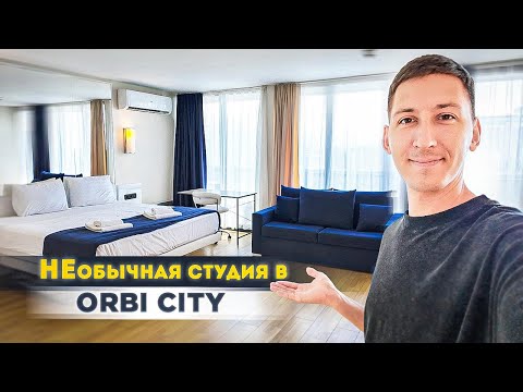 Видео: Необычный апартамент в ORBI City