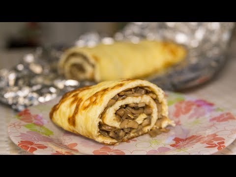Видео: Сырный рулет с грибами, рецепт закуски в духовке