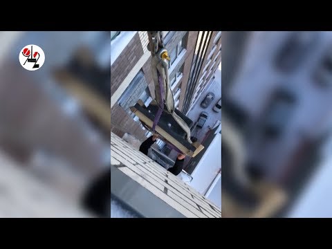Видео: Бетонную столешницу тянут на 21 этаж. Real video