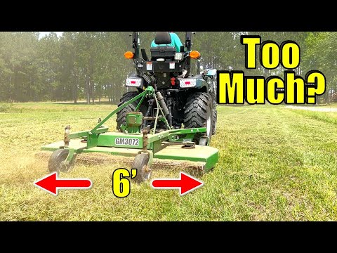 Видео: Что произойдет, если установить ОГРОМНУЮ газонокосилку на небольшой трактор мощностью 25 л.с.?