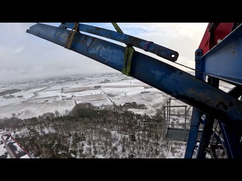 Видео: (Climbing down of COMANSA 21LC550, with hydraulic cage. (85m) Демонтаж COMANSA, на монтажной стойке.