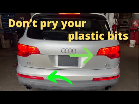 Видео: Удаление деталей без полного разрушения: замена заднего фонаря Audi Q7 2007 года.