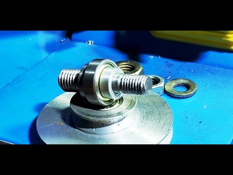 Видео: Ось для шкива на токарном WM210F400.