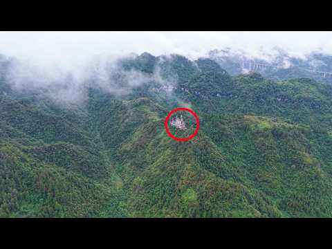 Видео: В горах Сянси, провинция Хунань, обнаружен таинственный красный дом. Для чего он используется?