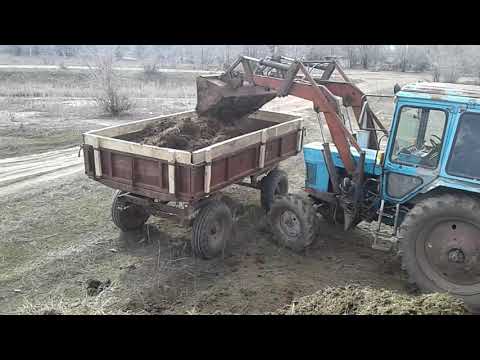 Видео: Погрузка навоза мтз -82