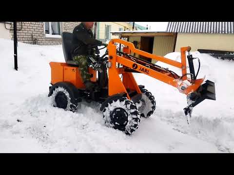 Видео: ЧТО ЛУЧШЕ ДЛЯ ЧИСТКИ СНЕГА? ОТВАЛ ИЛИ КОВШ?