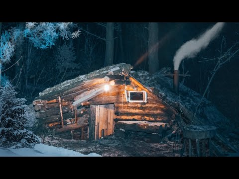 Видео: МОРОЗНАЯ НОЧЬ В МАЛЕНЬКОЙ ЗЕМЛЯНКЕ. ЗИМА НЕ ОТСТУПАЕТ. ЗА ОКНОМ -20, А ВНУТРИ +32. ЖИВУ ОДИН В ЛЕСУ.