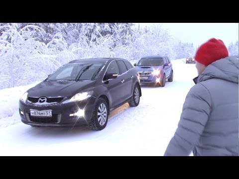 Видео: Зимний старт Forester vs Mazda CX-7