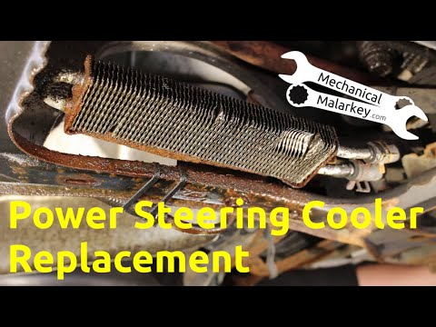 Видео: Замена радиатора гидроусилителя руля Dodge Grand Caravan 2001-2007