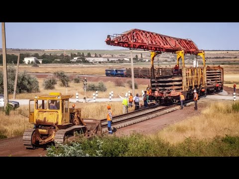 Видео: Укладка рельсошпальной решетки. Бессарабка