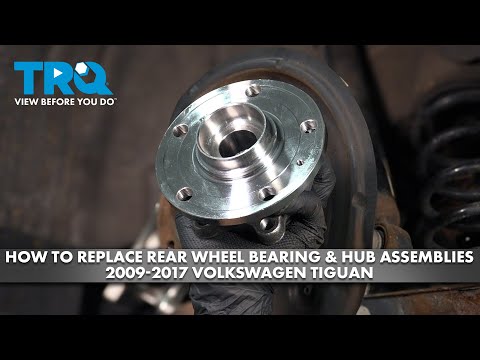 Видео: Как заменить подшипник задней ступицы и ступицу в сборе на Volkswagen Tiguan 2009-2017 гг.