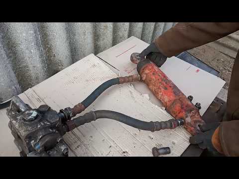 Видео: Принцип роботи гідросистеми на тракторах