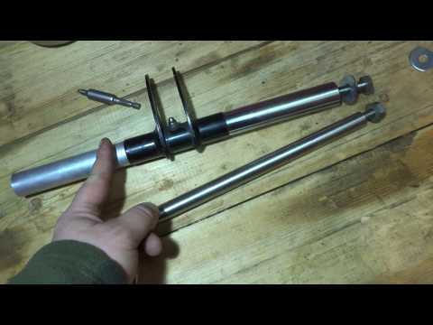 Видео: Ремонт подвески Arctic Cat Bearcat XT570(замена штатных осей)