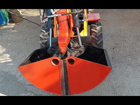 Видео: Мини-погрузчик  -  грейфер