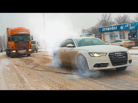Видео: AUDI вытаскивает ФУРЫ в снегопад. Поспорил с SUBARU
