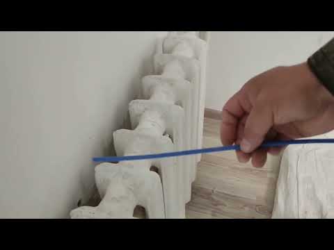 Видео: Закрепление чугунных радиаторов на стене