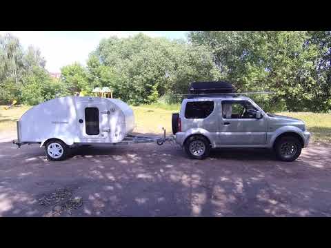 Видео: Часть 1.Тест и обзор прицепа-капли TRAVEL-CAMPER YOLO. 11 плюсов этого кемпера.